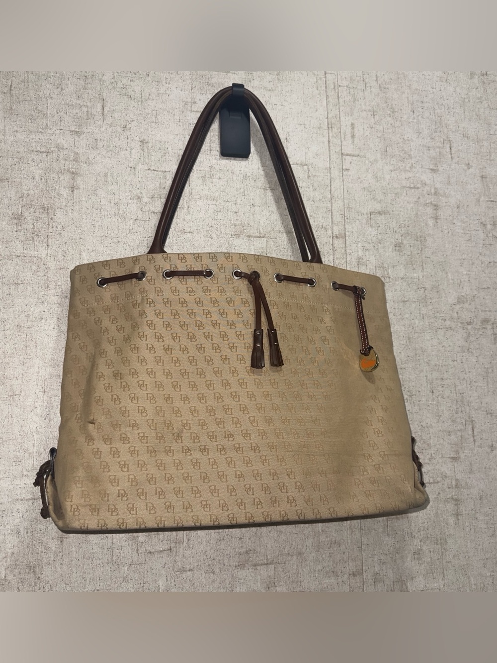 Dooney & Bourke Tan Monogram Drawstring Tote with Brown Trim